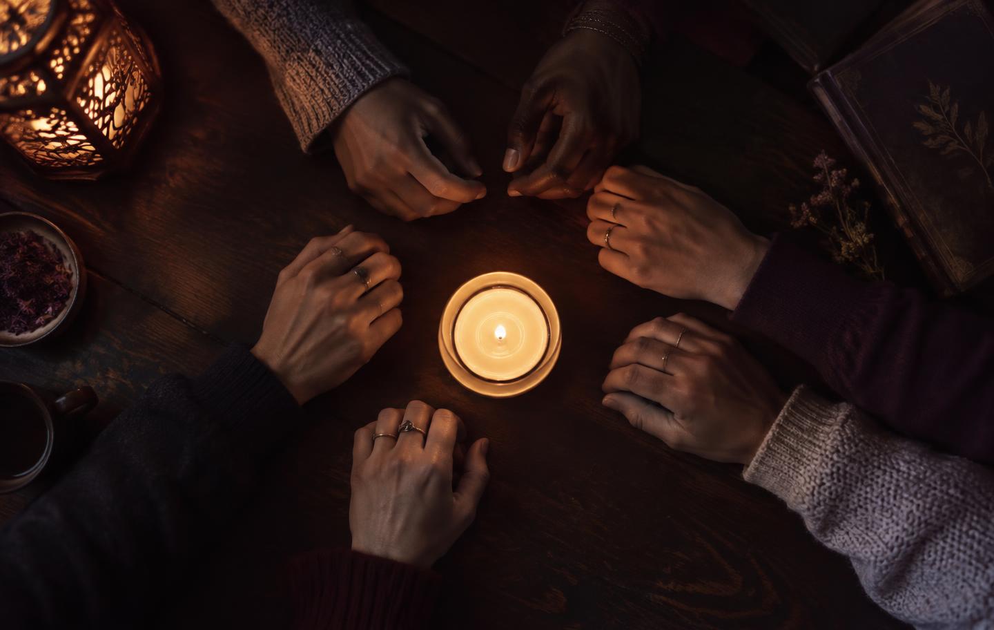A warm gathering illuminated by candlelight